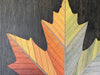 Video panning over the Autumn Maple Leaf wall art, showcasing the vibrant gradient colors and intricate geometric design.